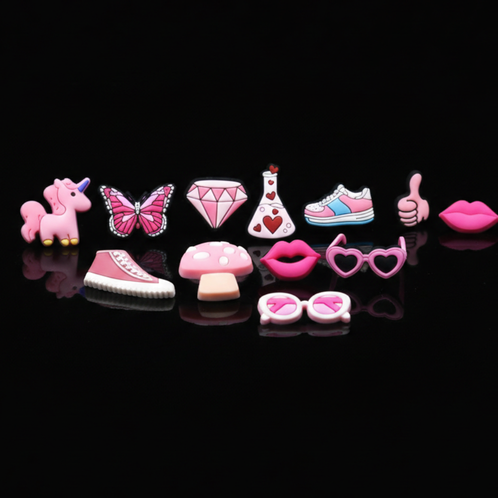 Collection of pink footwear accessories on a black background