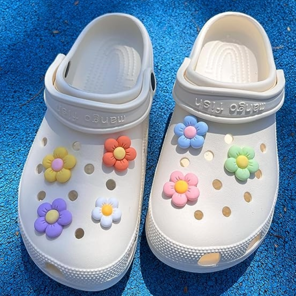 Pastel floral clog accessories with butterfly designs